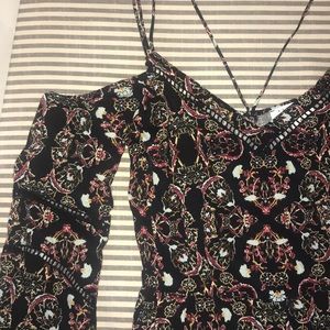 Black and patterned romper